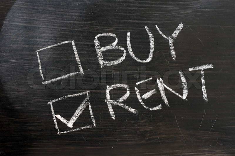 Buy or sell check boxes on a blackboard. Finance, economy, stock or real estate concept - time to buy or sell, stock photo